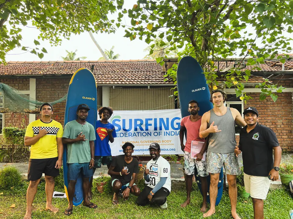 The Kuma Surf team on the beach